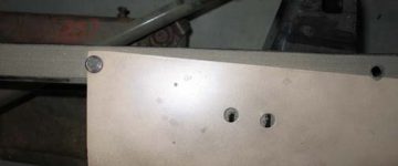 Reproduction On-Frame Anti-squeak - installation at hood clip bracket